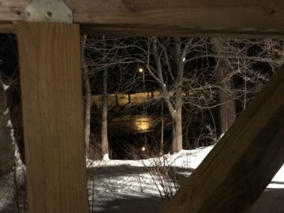 Nighttime pond, wooden beams