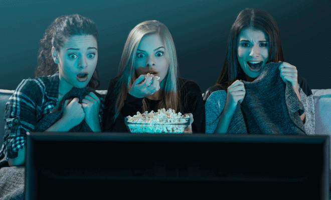 girls watching scary movie