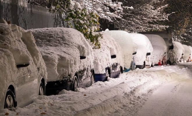 Snow covered vehicles