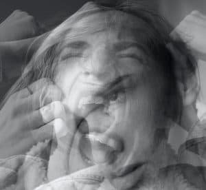 Screaming girl with face distortion