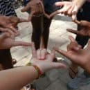 ASL hands in circle