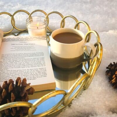 Tray with a book and coffe