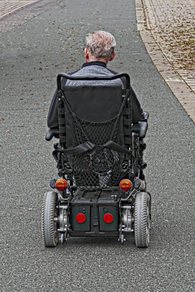 person in a monetarized wheelchair