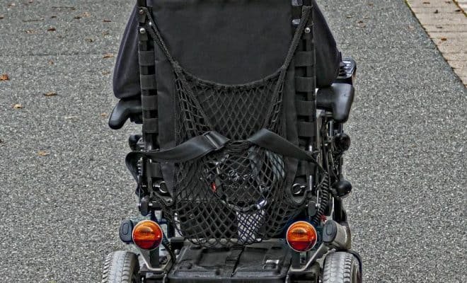 person in a monetarized wheelchair