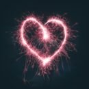 A firework display in the shape of a heart