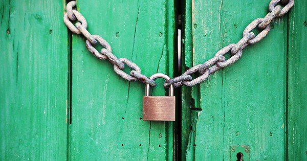 green door with padlock