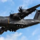 An army air force plane hovering in the sky