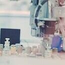 A laboratory bench with test tubes and microscope