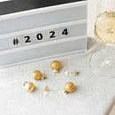 2024 calendar with wine glass and gold decor