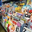 an assortment of magazines on display