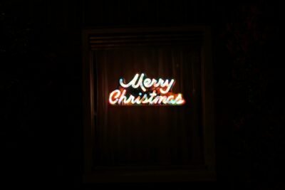 Blurred led lights that read "Merry Christmas"