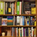 The image is of bookcase which full of books