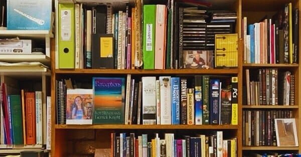 The image is of bookcase which full of books