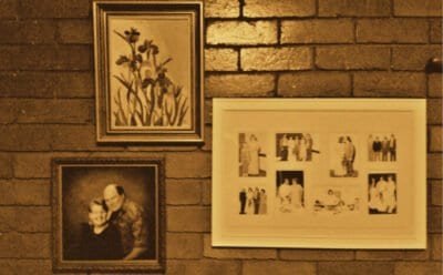 The image is of nostalgic photos hanging on a wall