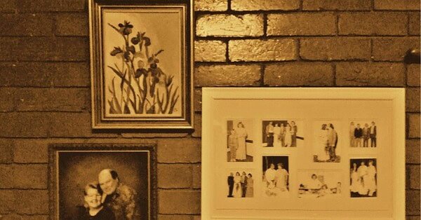 The image is of nostalgic photos hanging on a wall