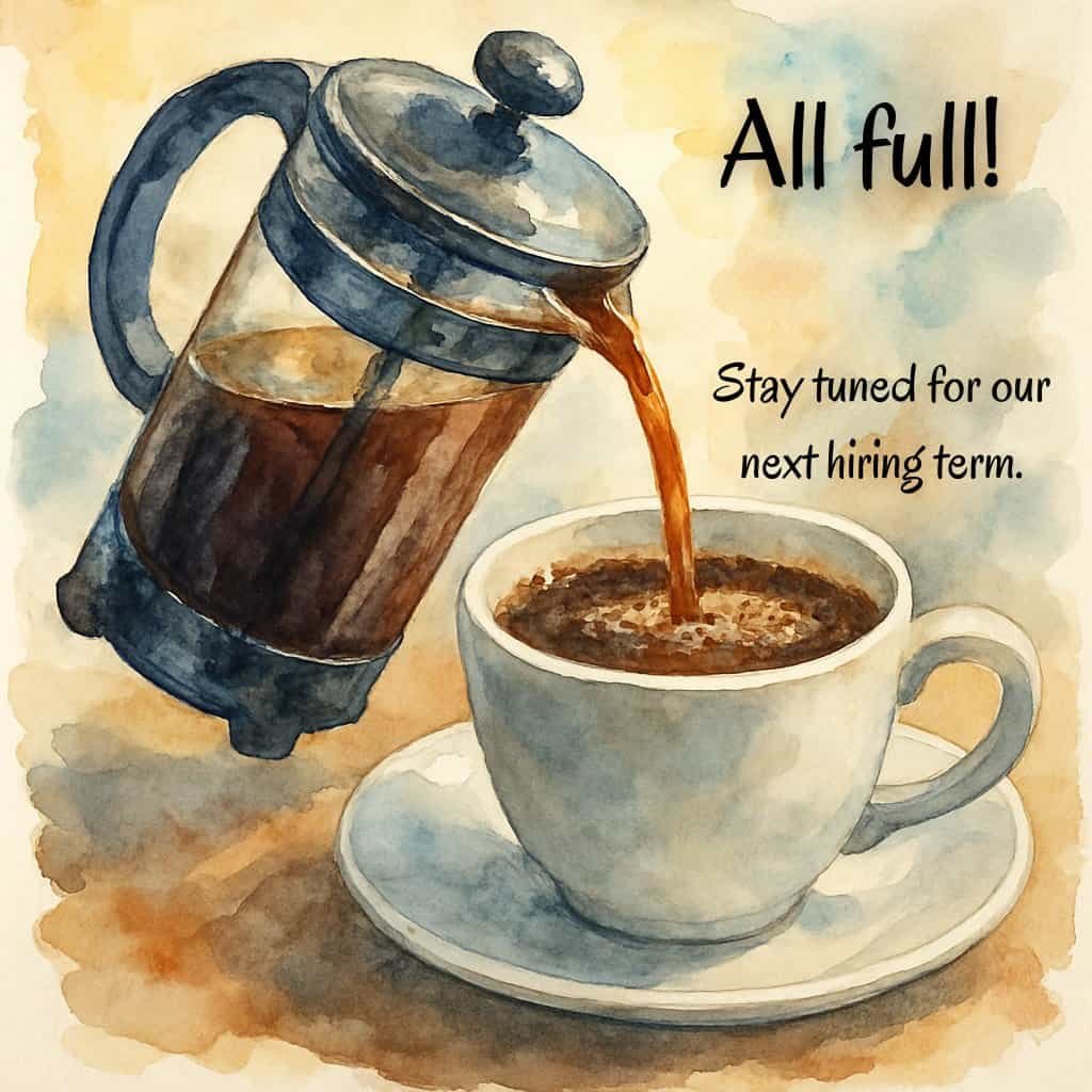 A French press pouring coffee into a white coffee cup.