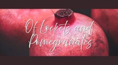 A dark, shadowed bundle of pomegranates with the text Of Lockets and Pomeganates.