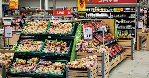 A picture of a grocery store's produce aisle