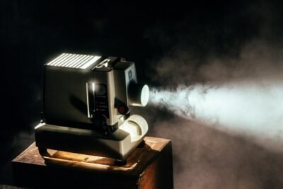 vintage projector in a smokey room
