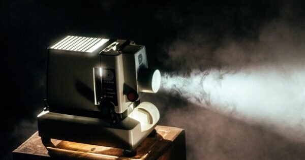 vintage projector in a smokey room