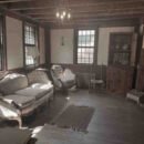 Image of the parlor of the Conjuring House in Rhode Island