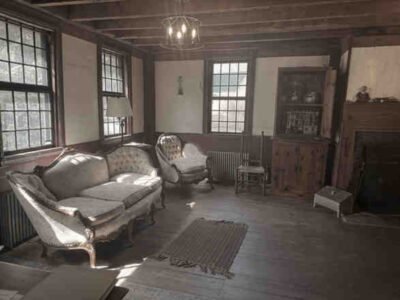 Image of the parlor of the Conjuring House in Rhode Island