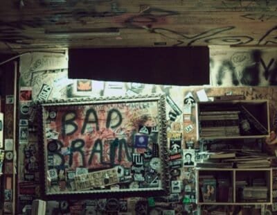 a photograph of a dilapidated and creative room with graffiti on the walls