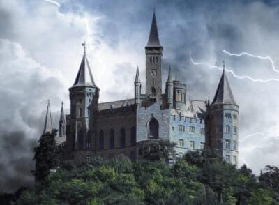 A forbidding stone castle sits atop a wooded hill while lightning clashes behind it.