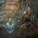 A lone woman in a busy, mass crowds in the city