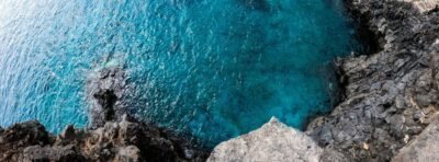 Cliff overlooking body of water