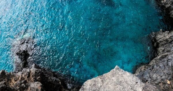Cliff overlooking body of water