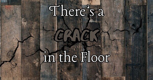 Image of wood floorboards with a crack in them with the words "there's a crack in the floor"