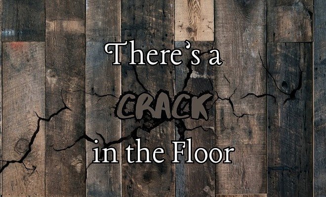 Image of wood floorboards with a crack in them with the words "there's a crack in the floor"
