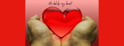 Hands holding a heart