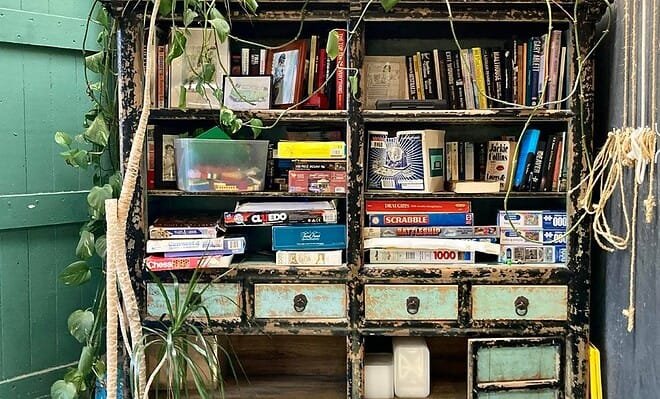 The image is of an old bookcase which sits in the corner of my favorite cafe