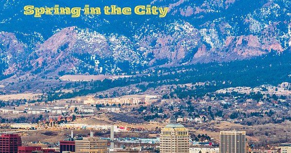 A city overlooking a mountain