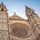 A tall cathedral building stretched towards the blue skies