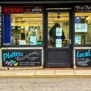 A fishmonger's shop with the title Howard and Son