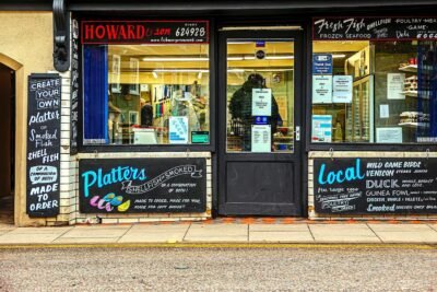 A fishmonger's shop with the title Howard and Son