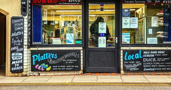 A fishmonger's shop with the title Howard and Son