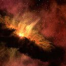 In space, a cloud of dust rings a yellow, flaming star.