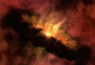 In space, a cloud of dust rings a yellow, flaming star.