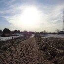 Image of a beach walkway as the sun is setting