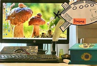 The image is a photomontage of my computer desk, a Pandora Box, and my imaginary space craft, 'ITMIMS' (Ivor's Time Machine In Micro Space)