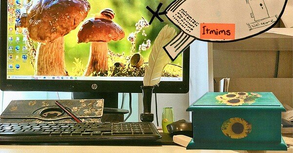 The image is a photomontage of my computer desk, a Pandora Box, and my imaginary space craft, 'ITMIMS' (Ivor's Time Machine In Micro Space)