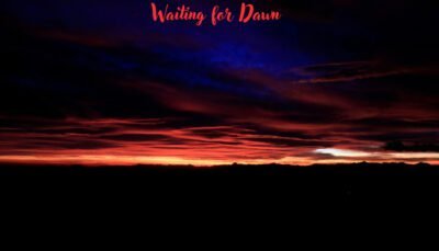 dawn breaking through a night sky