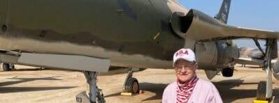 Man standing next to a plane