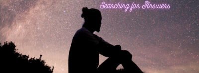 person sitting watching the night sky