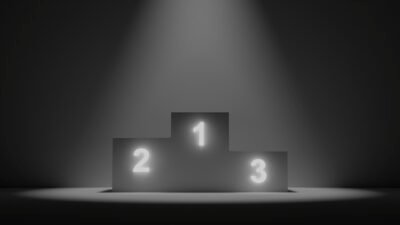 podium with lit numbers on a black and white background