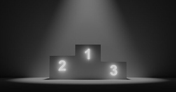 podium with lit numbers on a black and white background